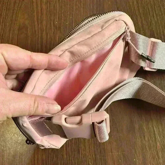 Light Pink Fanny Bag. Zip Closure. Pockets. Adjustable. 5”x9”. - Picture 4 of 8